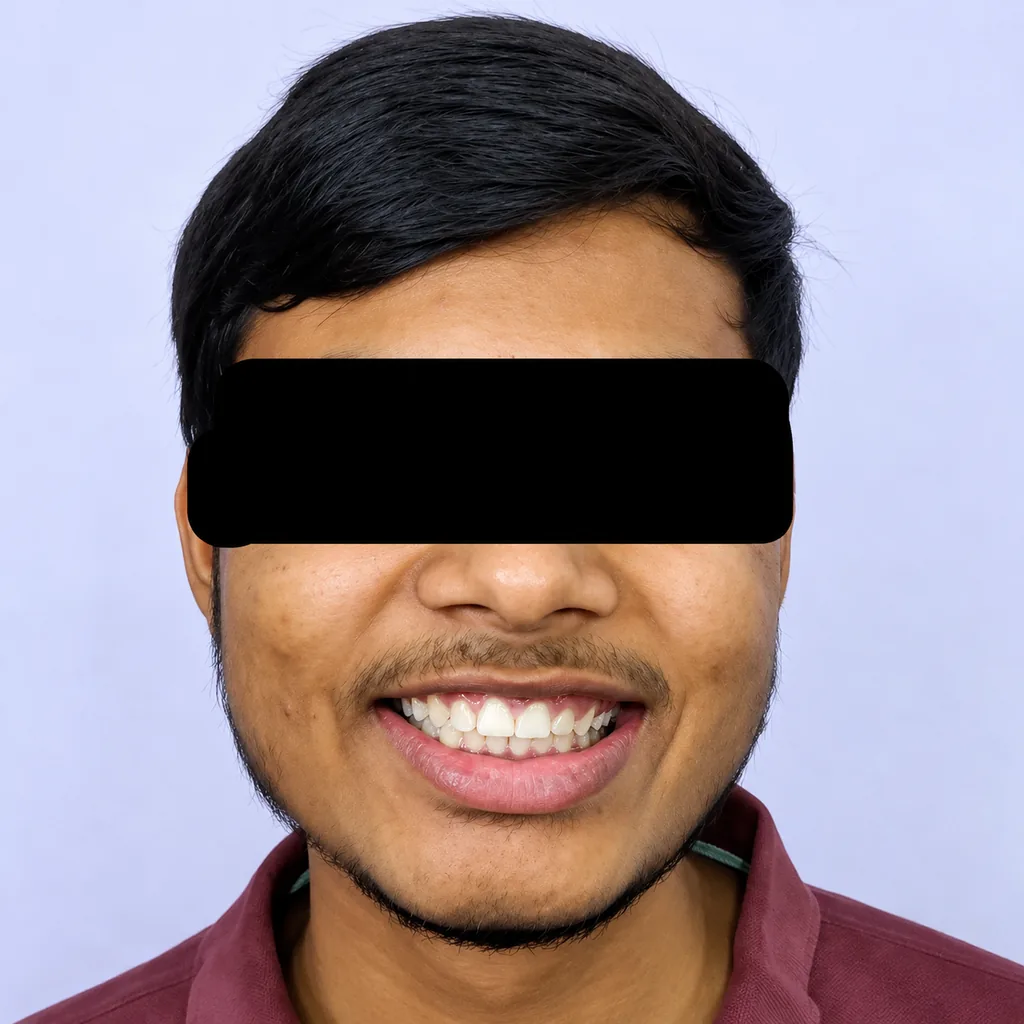Young male patient confident smile after treatment